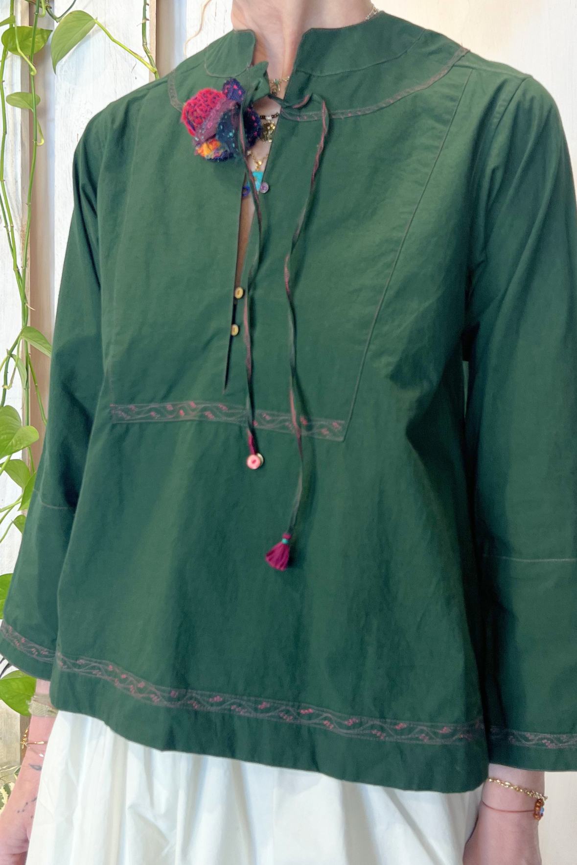 Blusa con ricami
