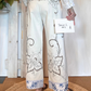 Pantalone con ricami