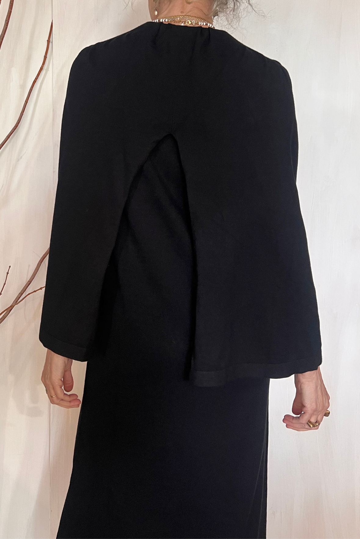Abito in maglia con mantella