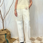 Top smanicato con pizzo e frange