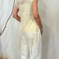 Top smanicato con pizzo e frange