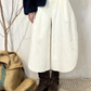Pantalone crop con spacco laterale
