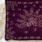 Clutch in velluto con ricami e applicazioni