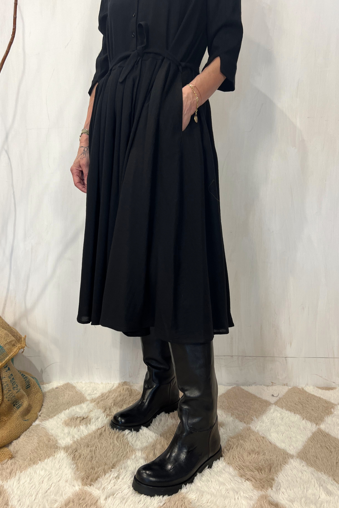 Abito polo in lana con cintura