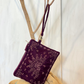 Clutch in velluto con ricami e applicazioni