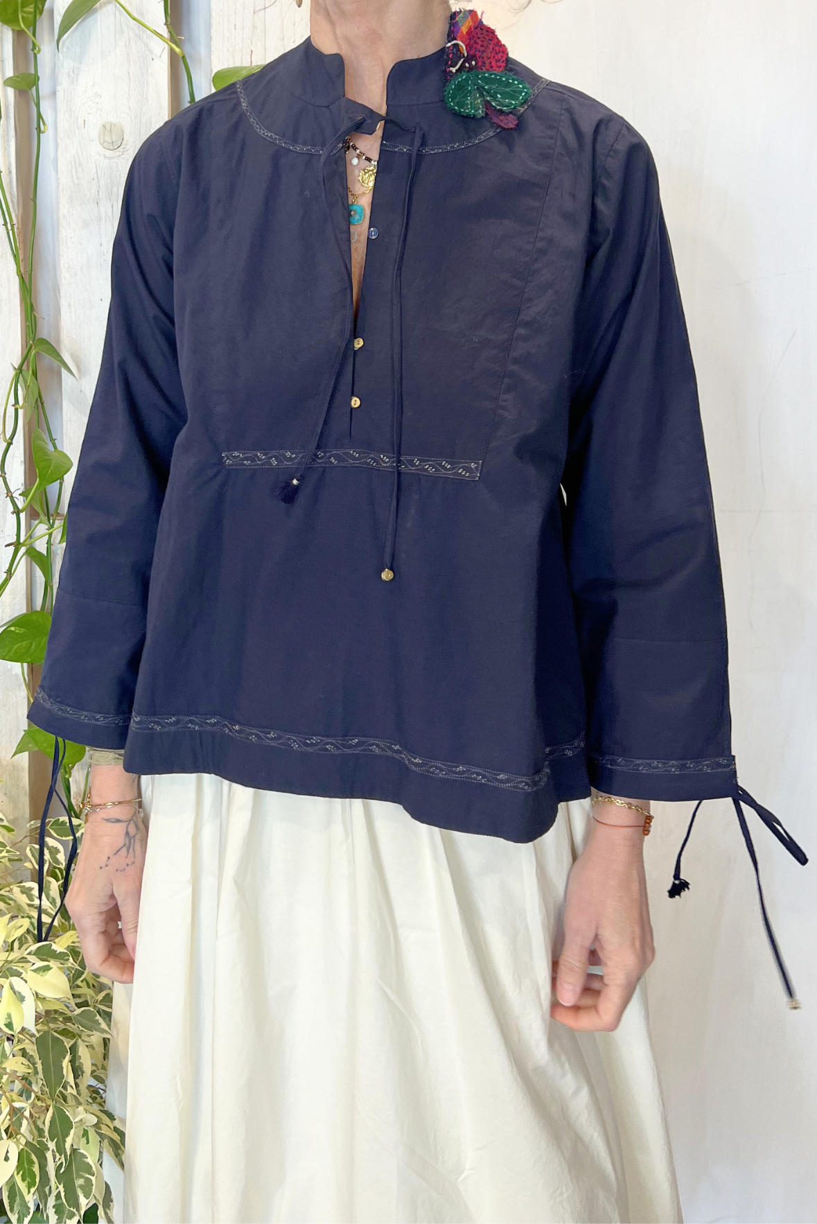 Blusa con ricami
